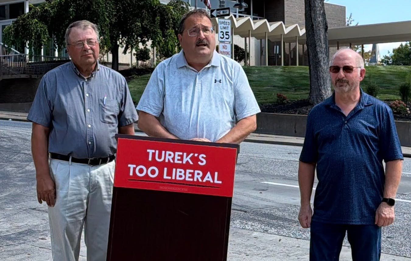Iowa GOP Unable To Prevent Own Podium From Leaning Left